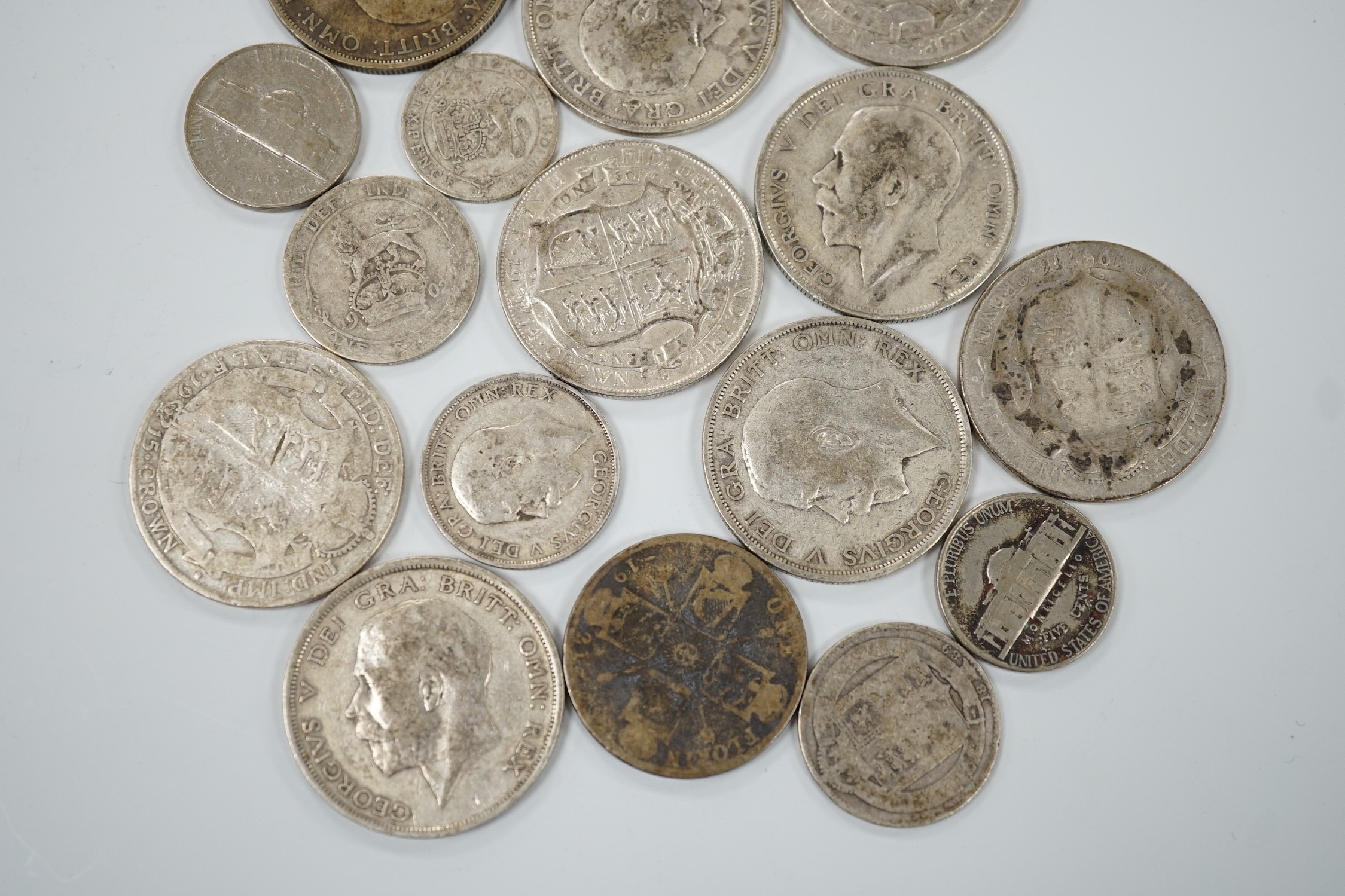 A selection of silver and cupro nickel coins, dating from Victoria to George V